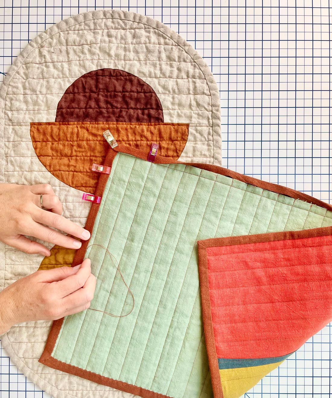 A hand-sewn quilt in the process of being made.
